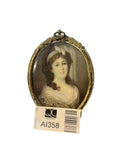 Oval 19th Century Miniature of a Lady by G. Bastel, Wearing a Yellow and Brown Striped Dress with White Hair Ribbon, on Ivorine in a Gilt Frame