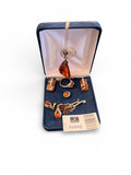 Collection of Amber Including Seven Earrings, One Amber Silver Ring, and One Amber Necklace