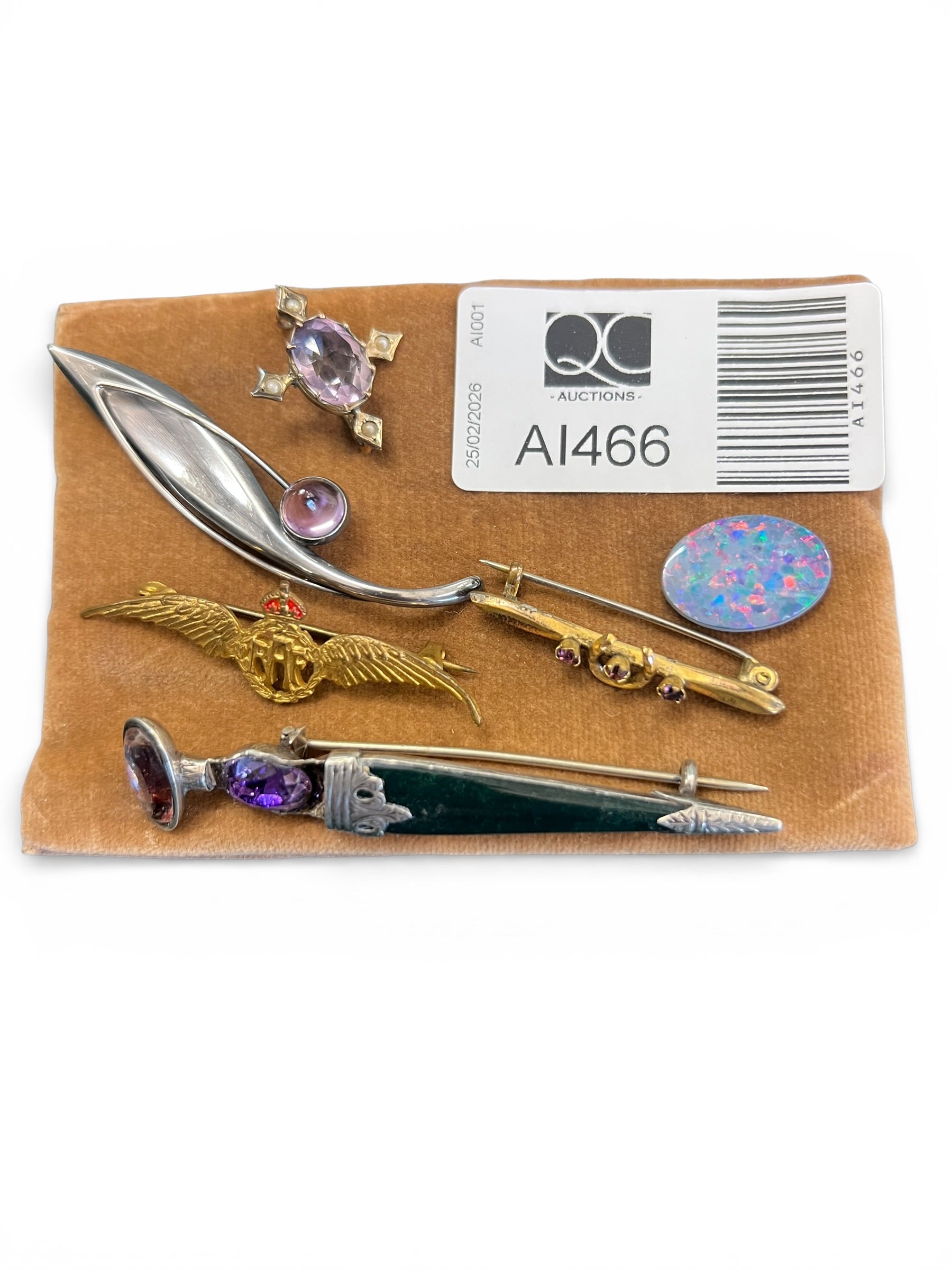 Collection of Mixed Items Including an RAF Badge, Four Brooches and One Opel Badge