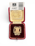 Two Items: Ladies’ Silver Ring and Silver Cricket Fob