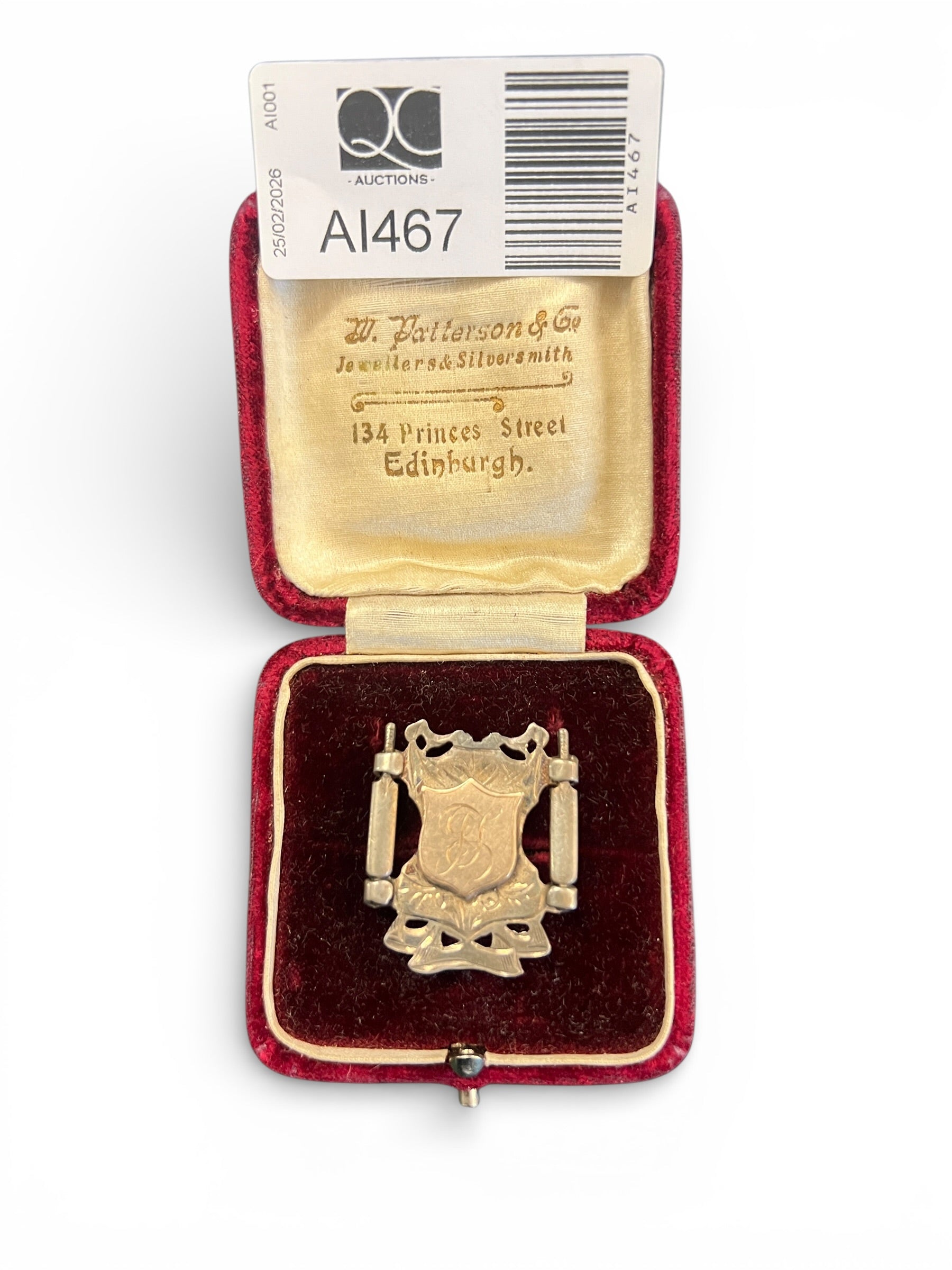 Two Items: Ladies’ Silver Ring and Silver Cricket Fob